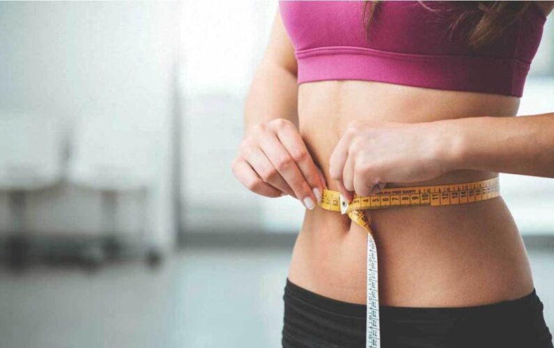 woman-measuring-stomach-1296x728